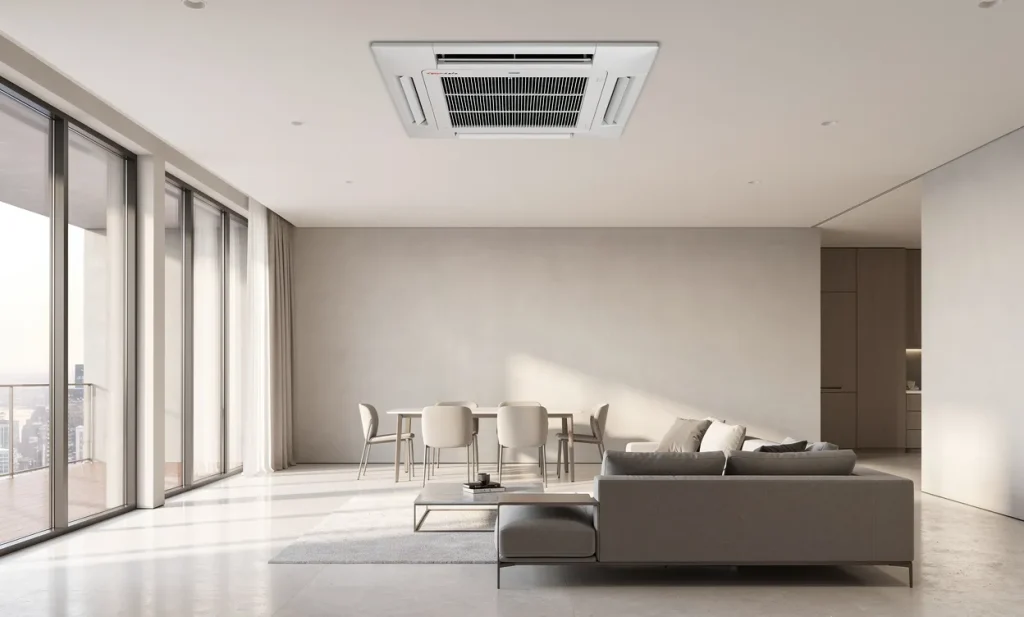 Un climatiseur gainable moderne est installé au plafond d’un grand séjour lumineux aux lignes architecturales épurées et au sol poli.